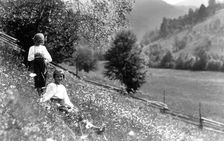 Two girls in a meadow, Bistrita Valley, Moldavia, north-east Romania, c1920-c1945. Artist: Adolph Chevalier