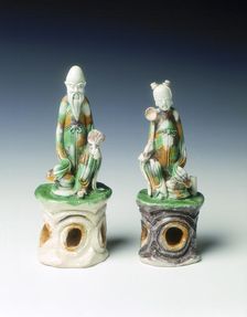Two incence stick holders in the form of immortals, late Ming dynasty, China, 1600-1644