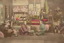 Two Japanese business men in their shop, 1868-1880. Creator: Felice Beato