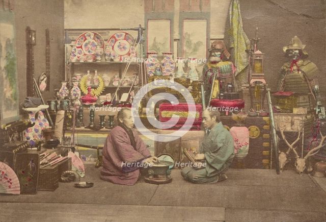Two Japanese business men in their shop, 1868-1880. Creator: Felice Beato.
