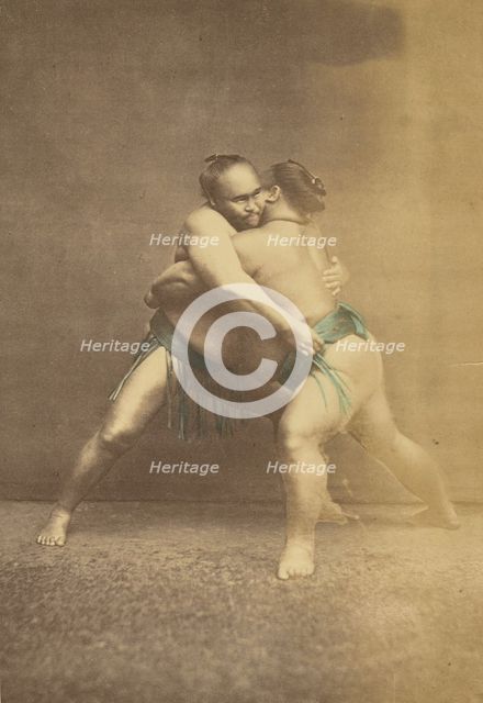 Two Japanese sumo westlers in gappling pose, 1868-1880. Creator: Felice Beato.