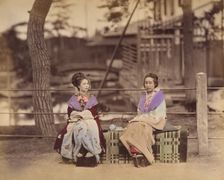 [Two Japanese Women Sitting on a Bench], 1870s. Creator: Unknown