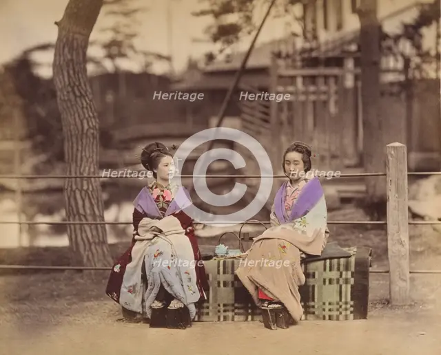 [Two Japanese Women Sitting on a Bench], 1870s. Creator: Unknown.