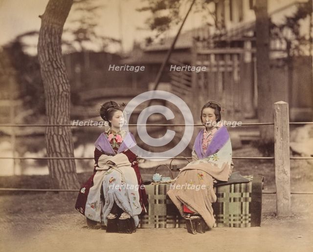 [Two Japanese Women Sitting on a Bench], 1870s. Creator: Unknown.