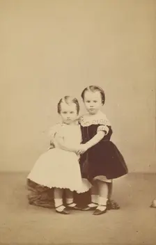 Two little girls embracing, 1865-1875. Creator: A. Crowe