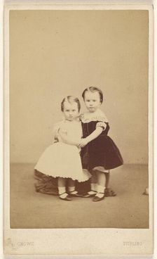 Two little girls embracing, 1865-1875. Creator: A. Crowe