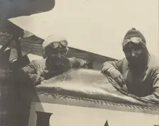 Two pilots in airplane, 1915-1930. Creator: Fédèle Azari