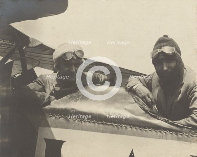 Two pilots in airplane, 1915-1930. Creator: Fédèle Azari.
