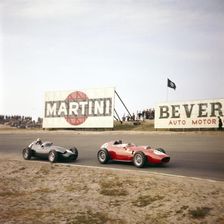 Two racing cars taking a bend, Dutch Grand Prix, Zandvoort, Holland, 1959