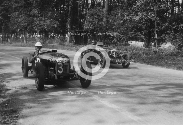 Two Riley Brooklands racing at Donington Park, Leicestershire, 1930s. Artist: Bill Brunell.