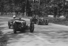 Two Riley Brooklands racing at Donington Park, Leicestershire, 1930s. Artist: Bill Brunell