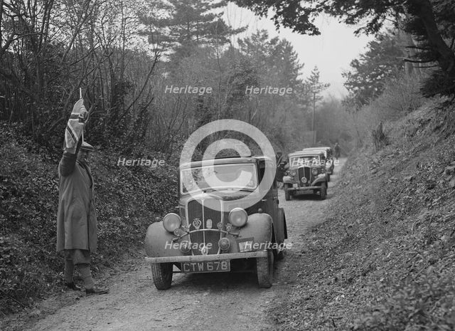 Two Standards competing in a Standard Car Club trial, late 1930s. Artist: Bill Brunell.