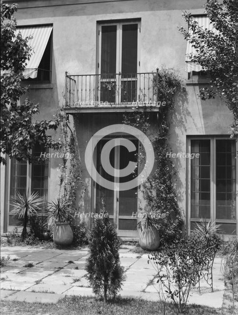 Two-story house, New Orleans or Charleston, South Carolina, between 1920 and 1926. Creator: Arnold Genthe.