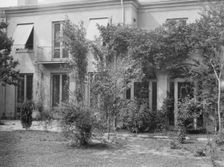 Two-story house, New Orleans or Charleston, South Carolina, between 1920 and 1926. Creator: Arnold Genthe