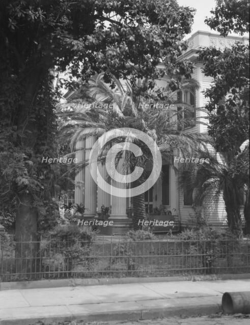 Two-story house with columned porch, New Orleans or Charleston, South Carolina, c1920-1926. Creator: Arnold Genthe.