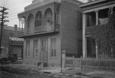 Two-story houses, New Orleans, between 1920 and 1926. Creator: Arnold Genthe