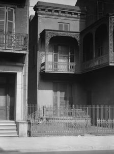 Two-story houses, New Orleans or Charleston, South Carolina, between 1920 and 1926. Creator: Arnold Genthe