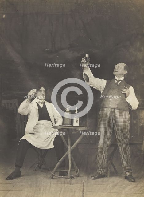 Two sailors pose on stage, holding up a drink, (between 1910 and 1919?). Creator: Unknown.