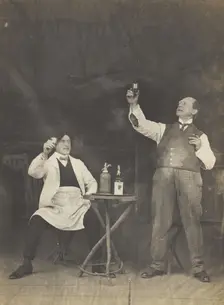 Two sailors pose on stage, holding up a drink, (between 1910 and 1919?). Creator: Unknown