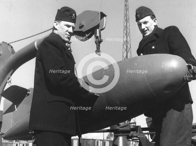 Two sailors with a torpedo, Sweden, 1955. Artist: Unknown