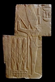 Two sculptured blocks showing Min, XVIIth Dynasty (c1630 BC-c1540 BC)