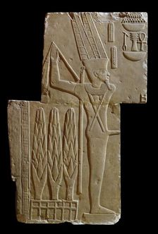 Two sculptured blocks showing Min, XVIIth Dynasty (c1630 BC-c1540 BC)