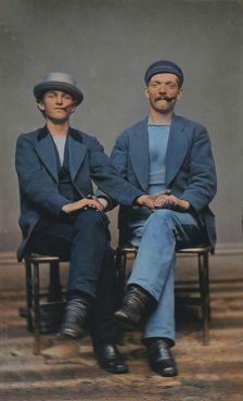 Two Seated Young Men Holding Hands, 1880s. Creator: Unknown
