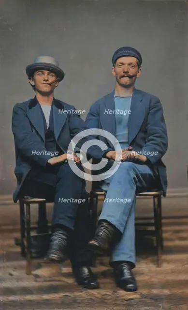 Two Seated Young Men Holding Hands, 1880s. Creator: Unknown.