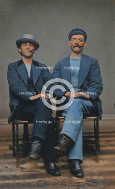 Two Seated Young Men Holding Hands, 1880s. Creator: Unknown.