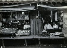 Two shops or market stalls, in Korea, c1900. Creator: Unknown