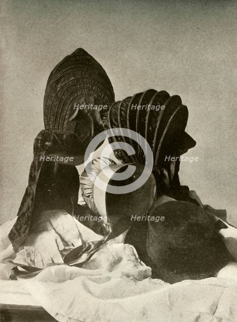 'Two silk calashes; riding-cap; Quaker bonnet; hat; gloves; and skirt', c18th century, (1937). Creator: Unknown.