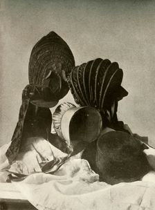 Two silk calashes; riding-cap; Quaker bonnet; hat; gloves; and skirt c18th century, (1937). Creator: Unknown