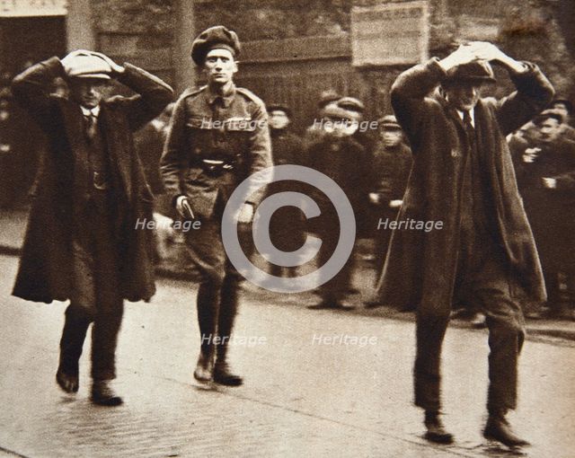 Two Sinn Fein members arrested by British troops, Dublin, Ireland, 1920.  Creator: Unknown.