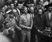 Two Soldiers at a Trial of Leading Fascists, 1944. Creator: British Pathe Ltd