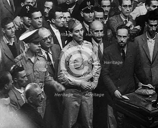 Two Soldiers at a Trial of Leading Fascists, 1944. Creator: British Pathe Ltd.
