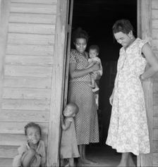 Two tobacco tenant mothers (related) with part of their children, Wake County, North Carolina, 1939. Creator: Dorothea Lange