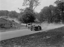 Two Wolseleys racing, Donington Park Race Meeting, Leicestershire, 1933. Artist: Bill Brunell