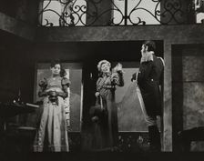 Two woman and a man, standing, 1938. Creator: Unknown