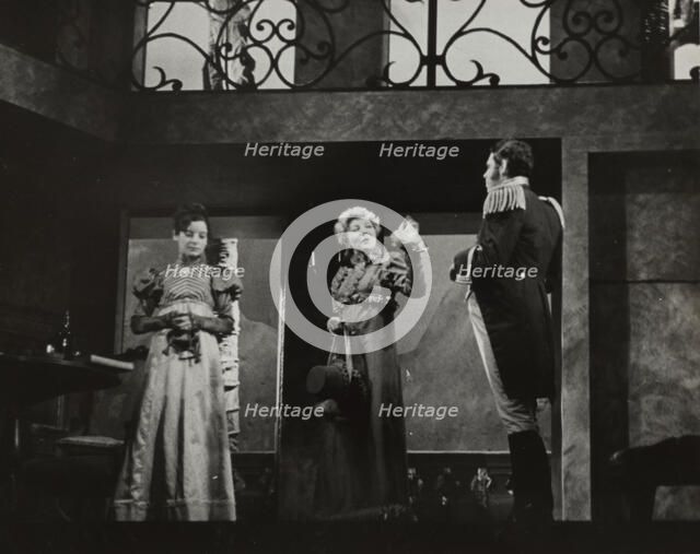 Two woman and a man, standing, 1938. Creator: Unknown.