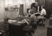 Two women at work in the wages office, Rowntree factory, York, Yorkshire, 1952