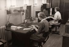 Two women at work in the wages office, Rowntree factory, York, Yorkshire, 1952