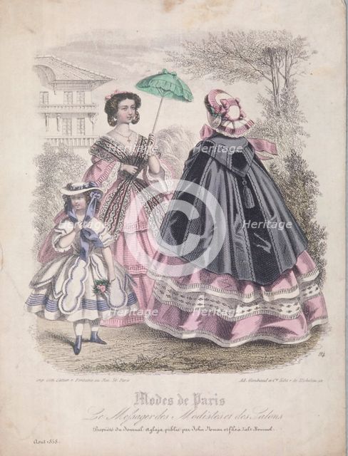 Two women and a child wearing the latest fashions in a garden setting, 1858. Artist: Anon