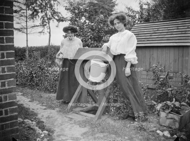 Two women beside a well, near Princes Risborough, Buckinghamshire, 1903. Artist: A Newton