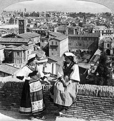 Two women in traditional costume in Rome, Italy.Artist: Underwood & Underwood