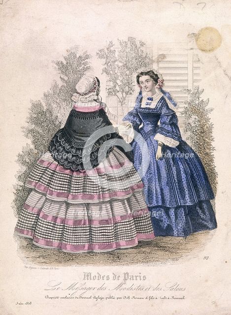 Two women wearing the latest fashions in a garden setting, 1858. Artist: Anon