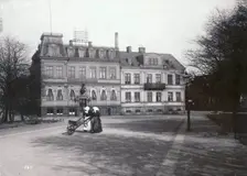 Two women with a wheelbarrow on their way to the fish market, Landskrona, Sweden, 1900. Creator: Borg Mesch