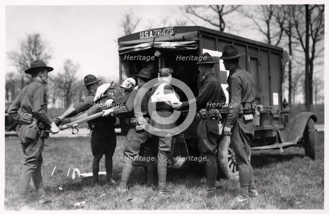 Two wounded soldiers being helped into an ambulance, Fort Sheridan, Illinois, USA, 1930. Artist: Unknown