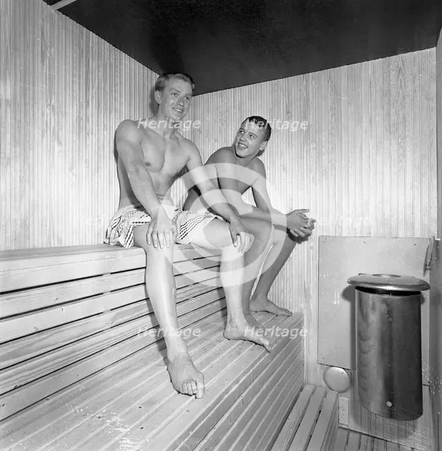 Two young men enjoying a sauna, Landskrona, Sweden, 1959. Creator: Unknown.