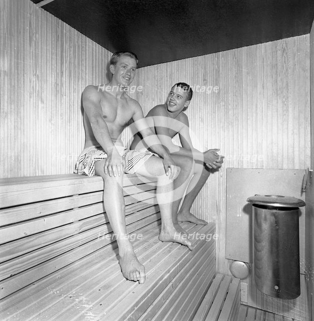 Two young men enjoying a sauna, Landskrona, Sweden, 1959. Creator: Unknown.