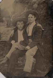 Two Young Men in Straw Hats, One Seated in the Other's Lap, 1870s-80s. Creator: Unknown
